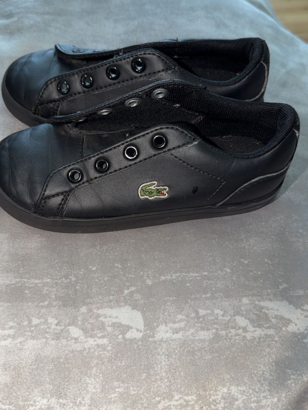 Kid’s Lacoste Black Slip-On Leather Sneakers with Green Croc Emblem
